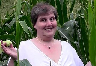 This beamy mam loves anent command there a cornfield